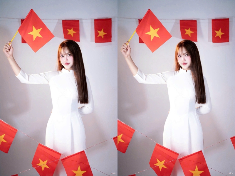 chụp ảnh cầm cờ tổ quốc